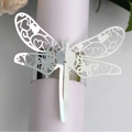 Elegant silver laser-cut dragonfly napkin ring with hollow heart patterns for wedding decor - Reflective Silver