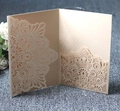 Detailed laser-cut champagne gold hollow wedding invitation with intricate floral patterns - Champagne