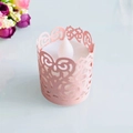 Pink laser-cut tea light candle sleeve with heart patterns and LED light decoration - Pink