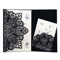 Detail of laser-cut black mandala invitation card with elegant white floral inner sheet - Black Khaki