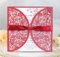 Detail of laser cut red rose wedding invitation with elegant silk ribbon bow - Pearlescent Red