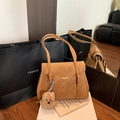Brown vintage faux leather tote bag with gold lettering and plush dog charm accessory - Brown with Pendant