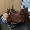 Vintage dark brown crescent shoulder bag with gold chain and plush dog charm detail - With Pendant / Brown