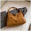 Caramel vintage faux leather tote bag with gold ring hardware on a white background - Brown No Pendant