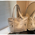 Cream corduroy tote bag with vertical stripes and side metal zipper pocket - Off White