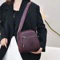 Bolso bandolera de nailon burdeos con compartimentos con cremallera y correa ancha - Púrpura profundo