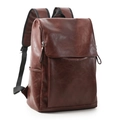Side view of a brown leather backpack showing textured PU material and flap closure design - Red Brown