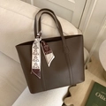 Dark brown faux leather tote bag with vertical stitching and decorative silk scarf detail - Brown