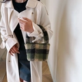 Furry plaid bucket bag in green and black check pattern with soft plush finish - Green