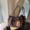Dark brown woven leather tote bag with elegant handles and cute plush puppy charm - Coffee with Pendant