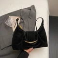 Matte black leather shoulder bag with gold hardware detail on minimalist white bedding - Black without Pendant