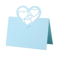 Detailed laser-cut hollow heart design on a light blue wedding place card in macro view - Pearl Pale Blue