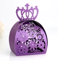 Detail view of purple laser-cut crown candy box featuring pearlescent paper and floral patterns - Dark Purple