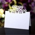 Elegant white laser-cut heart place card for weddings with intricate hollow pattern - White