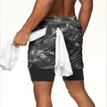 Detail of men's camouflage sports shorts featuring a functional rear towel loop holder - M / Black Lining Graffiti Gray Camouflage
