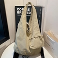 Grande borsa hobo kaki a tracolla con dettaglio nodo e ampia tasca frontale - Cachi