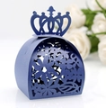 Detail view of laser-cut floral pattern and crown handle on navy blue wedding favor box - Sapphire Blue