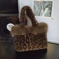 Plush leopard print faux fur tote bag with long brown trim and top handle design - Brown