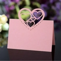 Pink laser-cut heart table card for weddings and events with a refined hollow design - Pink