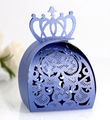 Macro shot of dark purple crown candy box featuring intricate laser-cut heart patterns - Sapphire Blue