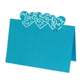 Detail view of light blue laser-cut heart place cards with elegant floral scroll patterns - Sky Blue