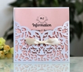 Elegant laser-cut wedding invitation with white lace sleeve and cream silk ribbon bow - White