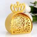 Elegant gold laser-cut candy box with hollow rose patterns and a crown handle - Gold