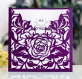 Detail of laser-cut purple glitter wedding invitation with intricate rose flower hollow patterns - Dark Purple