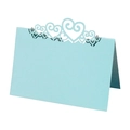 Detail of light blue laser-cut place card featuring intricate hollow heart-shaped designs - Pearl Pale Blue