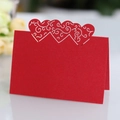 Red pearlescent place card with laser-cut hollow hearts and white vine patterns - Pearlescent Red