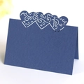 Navy blue laser cut heart place card with intricate floral scroll patterns on paper - Sapphire Blue