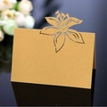 Golden laser-cut lily place card with elegant hollow design and shimmer finish - Gold
