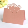 Rose gold laser-cut hollow heart place card for weddings and elegant parties - Pink
