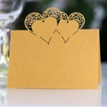Elegant laser cut pearl gold place card featuring three hollow heart shapes for events - Gold