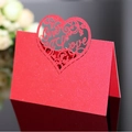 Foldable red glitter place card featuring a laser-cut heart and One Love lettering - Pearlescent Red