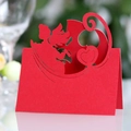 Laser-cut red wedding place card featuring angel and heart motifs in elegant folded paper - Pearlescent Red