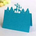 Sky blue laser-cut reindeer and Christmas tree place card for festive table seating - Sky Blue