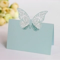 Sky blue hollow butterfly place card with intricate laser-cut floral patterns - Light Blue