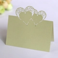 Sage green laser-cut place card with triple hollow heart design for weddings - Emerald Green