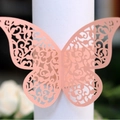 Rond de serviette papillon pêche avec motif floral ajouré découpé au laser élégant - Rose