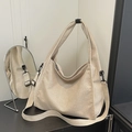 Borsa a spalla intrecciata beige oversize con ampia tracolla regolabile e grande capacità - Albicocca