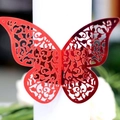 Elegant red hollow butterfly napkin ring with laser-cut vine patterns for wedding decor - Mirror Red