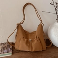 Minimalist large capacity brown leather shoulder bag with drawstring pocket in 2025 style - Brown