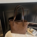 Deep brown matte tote bag with embossed cartoon patterns and golden metal rivets - Coffee No Charm