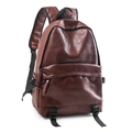 Detail view of large brown soft leather backpack with litchi texture and buckle strap - Red Brown