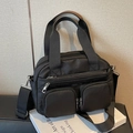 Versatile black multi-pocket crossbody nylon bag with adjustable wide strap and silver zippers - Black
