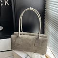 Fashionable olive green shoulder bag with unique crinkled texture and minimalist design - Green