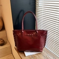 Large vintage burgundy tote bag in shiny patent leather with silver metal studs - Red