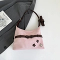 Pink suede hobo bag with brown leather bow and star appliques on white background - Pink Without Pendant