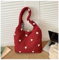 Detail of red plush tote bag with white hearts and black check pattern lining - Red Heart Charm